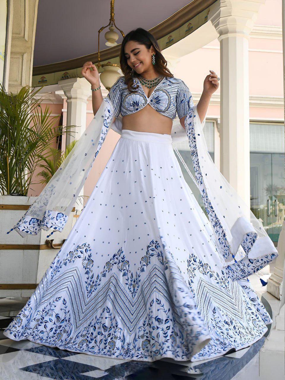 White Satin Lehenga Choli Set | Blue Floral Embroidery, Zari, Sequins, Net Dupatta