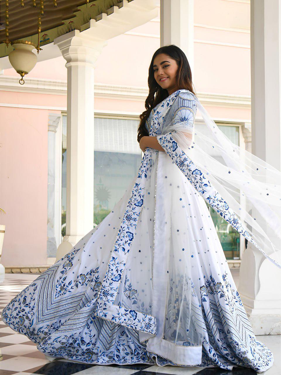 White Satin Lehenga Choli Set | Blue Floral Embroidery, Zari, Sequins, Net Dupatta